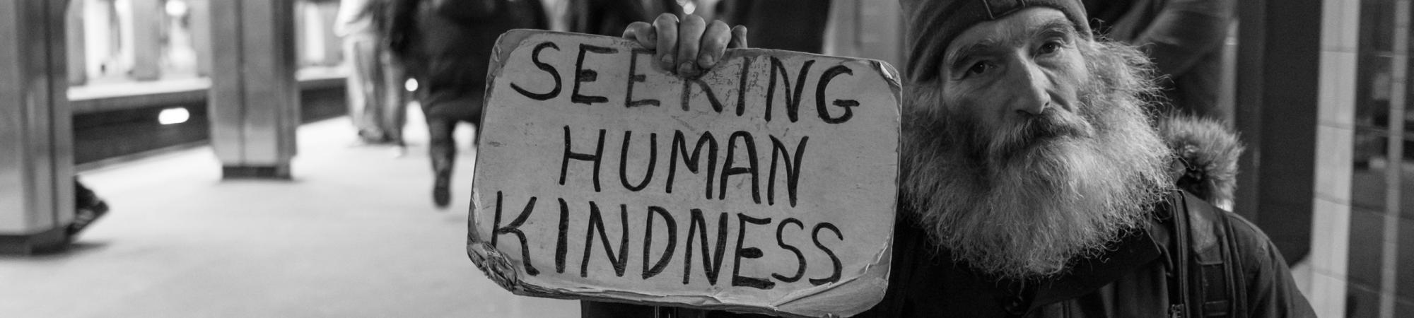 Homeless Man with a Sign